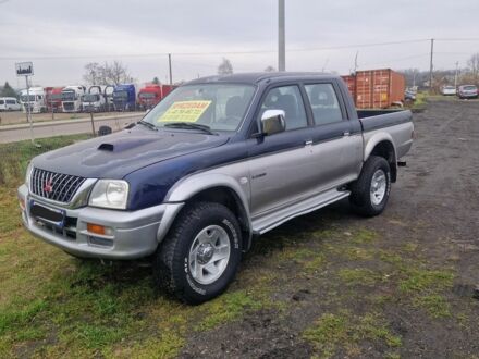 Синій Міцубісі Л 200, об'ємом двигуна 2.5 л та пробігом 250 тис. км за 6528 $, фото 1 на Automoto.ua