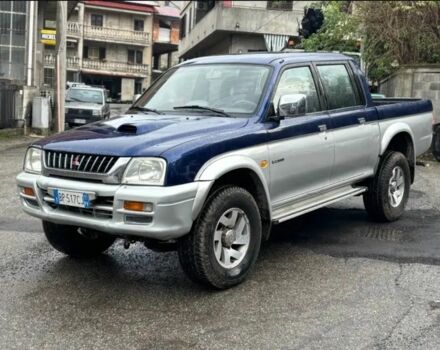 Синий Мицубиси Л 200, объемом двигателя 0 л и пробегом 320 тыс. км за 3000 $, фото 1 на Automoto.ua