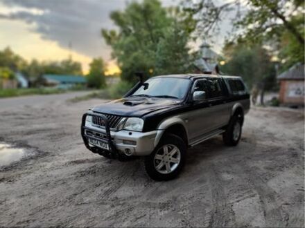 Міцубісі Л 200 2004 у Изюме на Automoto.ua Синій Міцубісі Л 200, об'ємом двигуна 2.5 л та пробігом 240 тис. км за 6500 $, фото 1 на Automoto.ua