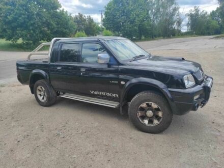 Міцубісі Л 200 2005 у Богуславе на Automoto.ua Синій Міцубісі Л 200, об'ємом двигуна 2.5 л та пробігом 160 тис. км за 6100 $, фото 1 на Automoto.ua