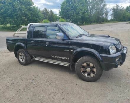 Синий Мицубиси Л 200, объемом двигателя 2.5 л и пробегом 160 тыс. км за 6100 $, фото 1 на Automoto.ua