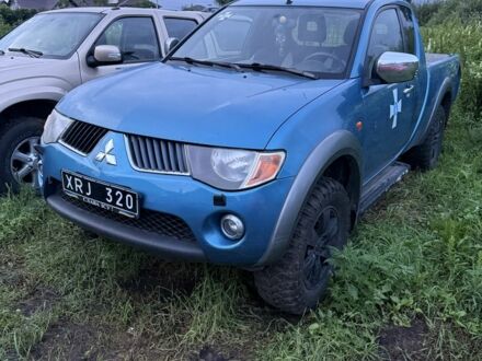 Синий Мицубиси Л 200, объемом двигателя 2.4 л и пробегом 110 тыс. км за 5500 $, фото 1 на Automoto.ua