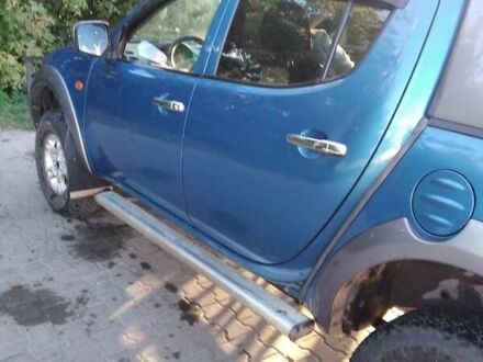 Синій Міцубісі Л 200, об'ємом двигуна 2.48 л та пробігом 224 тис. км за 12350 $, фото 1 на Automoto.ua