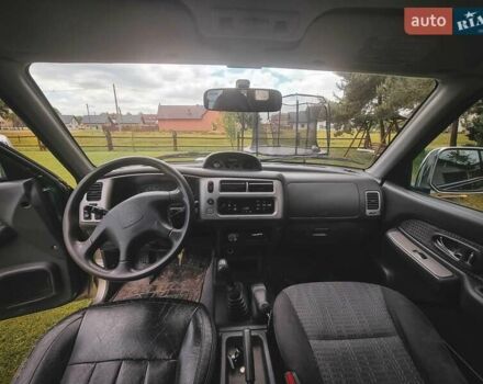 Зеленый Мицубиси Л 200, объемом двигателя 2.5 л и пробегом 268 тыс. км за 3100 $, фото 3 на Automoto.ua