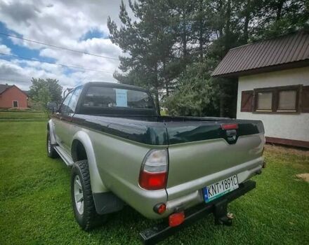 Зеленый Мицубиси Л 200, объемом двигателя 2.5 л и пробегом 268 тыс. км за 3100 $, фото 2 на Automoto.ua