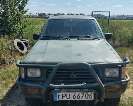 Зелений Міцубісі Л 200, об'ємом двигуна 2.5 л та пробігом 400 тис. км за 4700 $, фото 1 на Automoto.ua