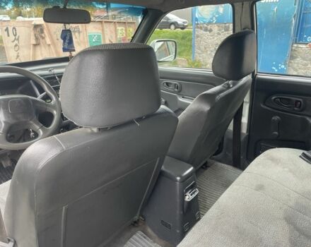 Зеленый Мицубиси Л 200, объемом двигателя 2.5 л и пробегом 250 тыс. км за 4200 $, фото 10 на Automoto.ua