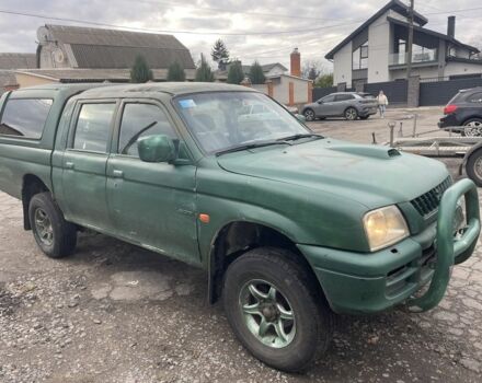 Зеленый Мицубиси Л 200, объемом двигателя 2.5 л и пробегом 250 тыс. км за 4200 $, фото 4 на Automoto.ua