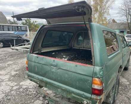 Зеленый Мицубиси Л 200, объемом двигателя 2.5 л и пробегом 250 тыс. км за 4200 $, фото 14 на Automoto.ua