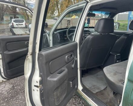 Зеленый Мицубиси Л 200, объемом двигателя 2.5 л и пробегом 250 тыс. км за 4200 $, фото 12 на Automoto.ua