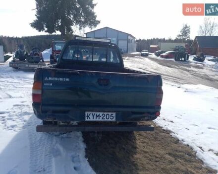 Зеленый Мицубиси Л 200, объемом двигателя 2.5 л и пробегом 420 тыс. км за 4064 $, фото 6 на Automoto.ua