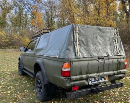 Зеленый Мицубиси Л 200, объемом двигателя 2.5 л и пробегом 280 тыс. км за 5700 $, фото 6 на Automoto.ua