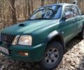 Зеленый Мицубиси Л 200, объемом двигателя 2.5 л и пробегом 300 тыс. км за 2900 $, фото 1 на Automoto.ua