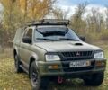 Зеленый Мицубиси Л 200, объемом двигателя 2.5 л и пробегом 280 тыс. км за 5700 $, фото 1 на Automoto.ua