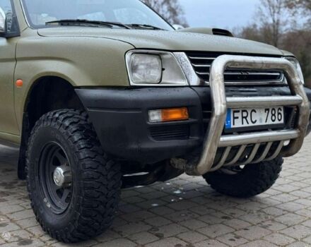 Зеленый Мицубиси Л 200, объемом двигателя 2.5 л и пробегом 197 тыс. км за 2600 $, фото 4 на Automoto.ua