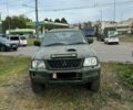 Зеленый Мицубиси Л 200, объемом двигателя 2.5 л и пробегом 200 тыс. км за 4005 $, фото 1 на Automoto.ua