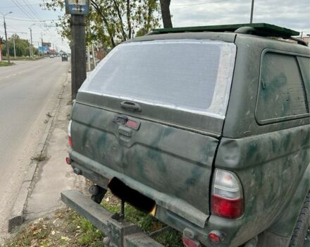 Зеленый Мицубиси Л 200, объемом двигателя 2.5 л и пробегом 200 тыс. км за 4005 $, фото 3 на Automoto.ua