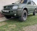 Зеленый Мицубиси Л 200, объемом двигателя 2.5 л и пробегом 170 тыс. км за 6513 $, фото 1 на Automoto.ua