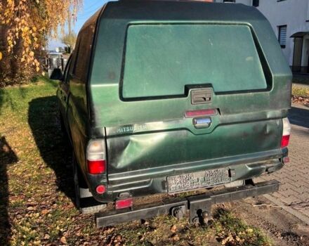 Зеленый Мицубиси Л 200, объемом двигателя 2.5 л и пробегом 380 тыс. км за 4875 $, фото 2 на Automoto.ua