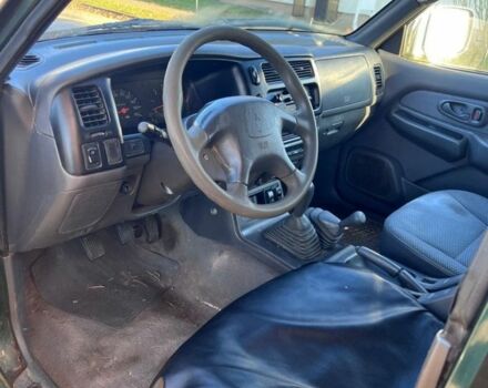 Зеленый Мицубиси Л 200, объемом двигателя 2.5 л и пробегом 380 тыс. км за 4875 $, фото 5 на Automoto.ua