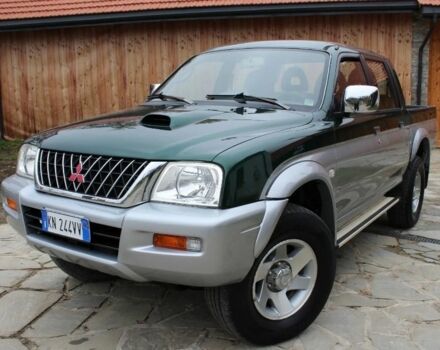 Зеленый Мицубиси Л 200, объемом двигателя 0 л и пробегом 232 тыс. км за 2500 $, фото 2 на Automoto.ua