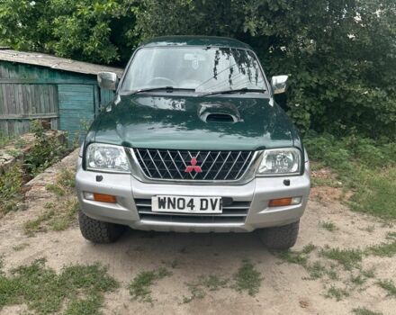 Зеленый Мицубиси Л 200, объемом двигателя 2.5 л и пробегом 124 тыс. км за 4800 $, фото 4 на Automoto.ua