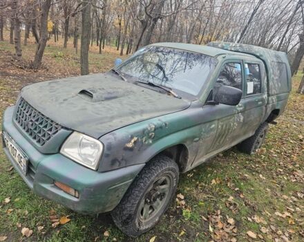 Зелений Міцубісі Л 200, об'ємом двигуна 2.5 л та пробігом 250 тис. км за 2620 $, фото 1 на Automoto.ua