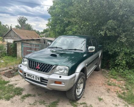 Зеленый Мицубиси Л 200, объемом двигателя 2.5 л и пробегом 124 тыс. км за 4800 $, фото 1 на Automoto.ua