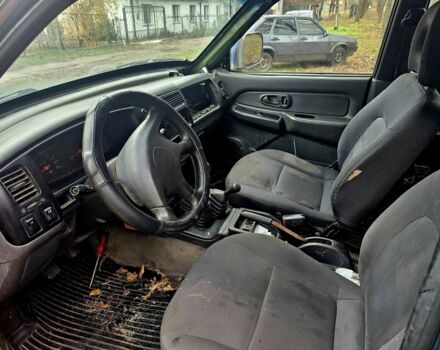 Зелений Міцубісі Л 200, об'ємом двигуна 2.5 л та пробігом 250 тис. км за 2620 $, фото 7 на Automoto.ua