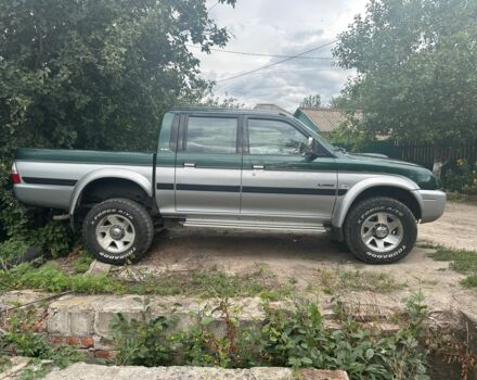 Зеленый Мицубиси Л 200, объемом двигателя 2.5 л и пробегом 124 тыс. км за 4800 $, фото 2 на Automoto.ua