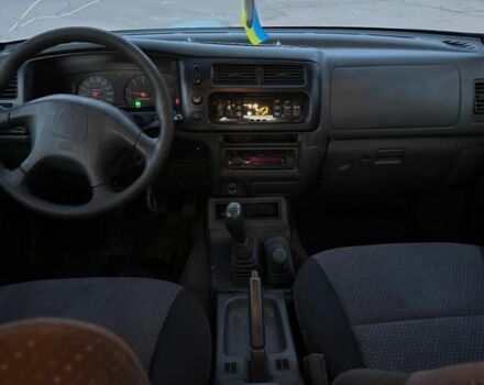 Зеленый Мицубиси Л 200, объемом двигателя 2.5 л и пробегом 380 тыс. км за 4400 $, фото 3 на Automoto.ua