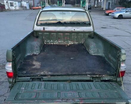 Зеленый Мицубиси Л 200, объемом двигателя 2.5 л и пробегом 380 тыс. км за 4400 $, фото 2 на Automoto.ua