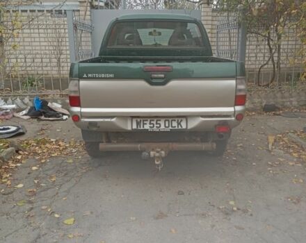 Зеленый Мицубиси Л 200, объемом двигателя 2.5 л и пробегом 200 тыс. км за 2500 $, фото 4 на Automoto.ua