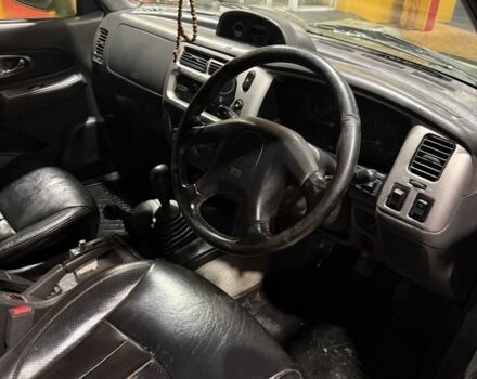 Зеленый Мицубиси Л 200, объемом двигателя 0 л и пробегом 200 тыс. км за 3700 $, фото 4 на Automoto.ua