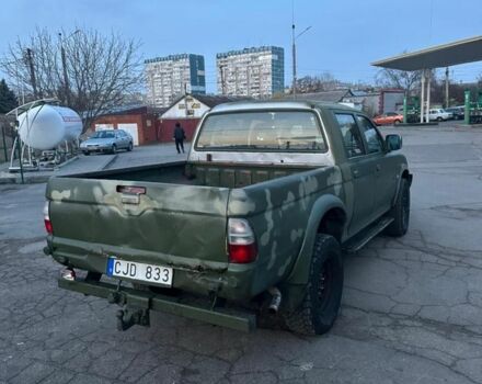 Зеленый Мицубиси Л 200, объемом двигателя 2.5 л и пробегом 380 тыс. км за 4400 $, фото 4 на Automoto.ua