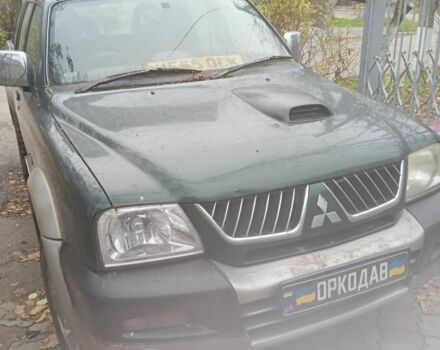 Зеленый Мицубиси Л 200, объемом двигателя 2.5 л и пробегом 200 тыс. км за 2500 $, фото 2 на Automoto.ua