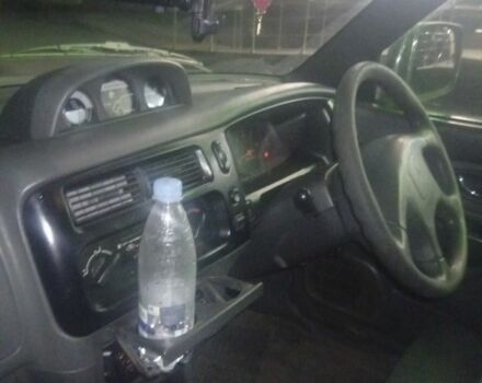 Зеленый Мицубиси Л 200, объемом двигателя 2.5 л и пробегом 500 тыс. км за 4971 $, фото 2 на Automoto.ua