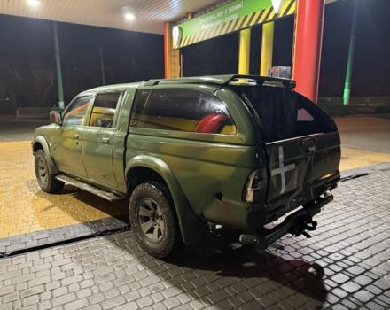 Зеленый Мицубиси Л 200, объемом двигателя 0 л и пробегом 200 тыс. км за 3700 $, фото 1 на Automoto.ua