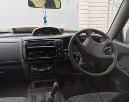 Зеленый Мицубиси Л 200, объемом двигателя 2.5 л и пробегом 200 тыс. км за 2500 $, фото 5 на Automoto.ua