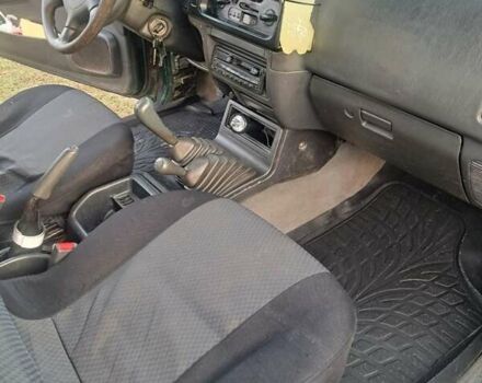 Зеленый Мицубиси Л 200, объемом двигателя 2.5 л и пробегом 264 тыс. км за 5537 $, фото 2 на Automoto.ua