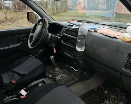 Зеленый Мицубиси Л 200, объемом двигателя 2.5 л и пробегом 264 тыс. км за 5537 $, фото 12 на Automoto.ua