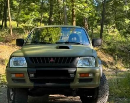 Зелений Міцубісі Л 200, об'ємом двигуна 2.5 л та пробігом 286 тис. км за 2700 $, фото 1 на Automoto.ua