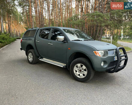 Мицубиси Л 200 2007 в Новомосковске на Automoto.ua Зеленый Мицубиси Л 200, объемом двигателя 2.5 л и пробегом 300 тыс. км за 10500 $, фото 7 на Automoto.ua