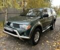 Зеленый Мицубиси Л 200, объемом двигателя 2.5 л и пробегом 132 тыс. км за 12500 $, фото 1 на Automoto.ua