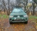 Зеленый Мицубиси Л 200, объемом двигателя 2.5 л и пробегом 299 тыс. км за 5500 $, фото 1 на Automoto.ua