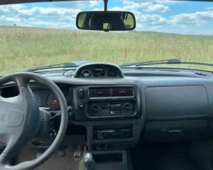 Зеленый Мицубиси Л 200, объемом двигателя 2.5 л и пробегом 259 тыс. км за 3597 $, фото 7 на Automoto.ua