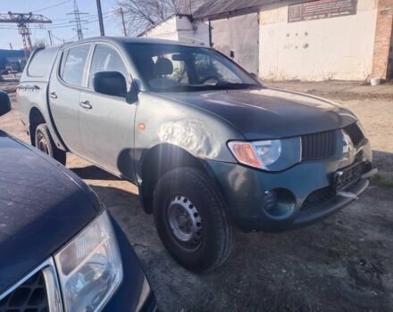 Зеленый Мицубиси Л 200, объемом двигателя 2.5 л и пробегом 170 тыс. км за 7524 $, фото 1 на Automoto.ua