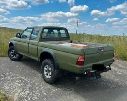Зеленый Мицубиси Л 200, объемом двигателя 2.5 л и пробегом 259 тыс. км за 3597 $, фото 4 на Automoto.ua