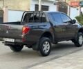 Зеленый Мицубиси Л 200, объемом двигателя 2.48 л и пробегом 200 тыс. км за 10999 $, фото 7 на Automoto.ua