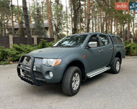 Мицубиси Л 200 2007 в Новомосковске на Automoto.ua Зеленый Мицубиси Л 200, объемом двигателя 2.5 л и пробегом 300 тыс. км за 10500 $, фото 3 на Automoto.ua